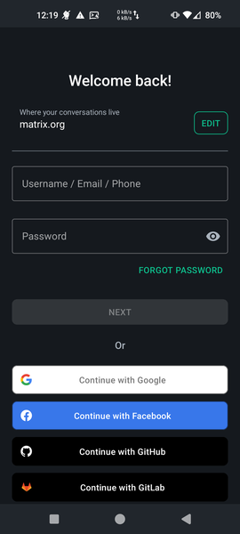 Element mobile login page. 'Welcome Back' is written at the top, and the default 'matrix.org' domain is listed. There is a button to edit whe default homeserver, text fields for username/email/phone, and password, and a 'next' button